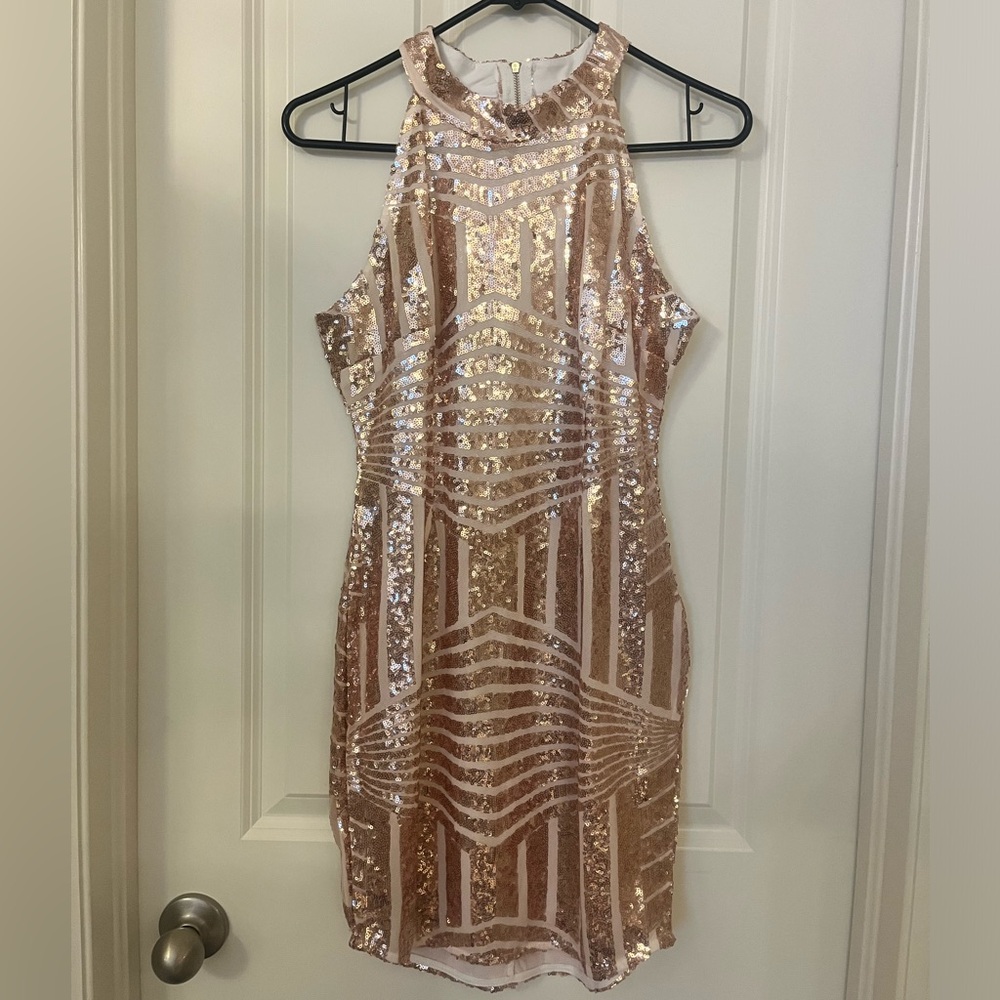 Medium rose gold bodycon/bandage dress.